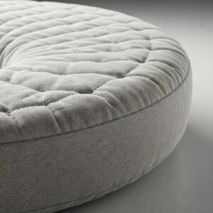 Detailed view of the soft fabric and quality stitching of a circle mattress.