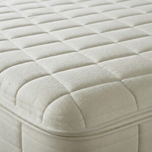 Detailed view of the quilted top of an ultra plush mattress, highlighting its softness.
