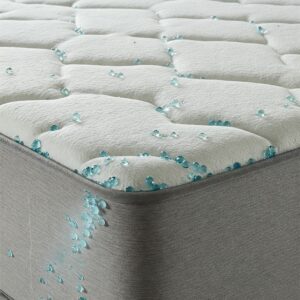 Detail of a 60 x 80 mattress featuring cooling gel technology for temperature regulation.