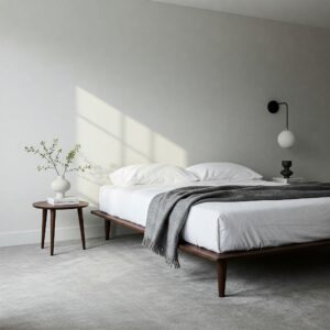 Simple and stylish king size mattress platform in a minimalist bedroom interior.