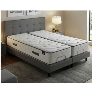A split california king mattress placed on a modern adjustable bed base, showcasing its compatibility.