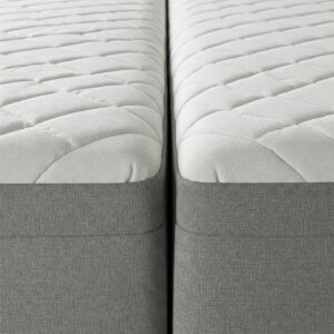 Detailed view of the split design in a split queen mattress for independent adjustment.
