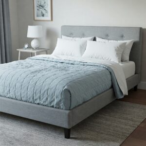 Cozy twin futon mattress set up as a comfortable bed with soft bedding.