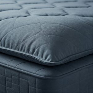 Close-up of the soft pillow top on a twin pillow top mattress.