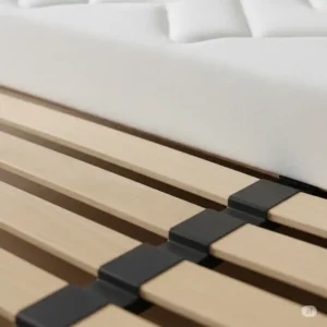 Close-up of a slatted bed frame for foam mattress, ensuring breathability.