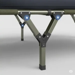 Close-up view of the reinforced frame and leg design of a camping cot, specifically engineered to provide stable support for an air mattress on a cot.
