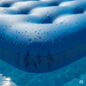 Close-up of a heavy-duty, puncture-resistant vinyl material on a pool floating mattress.