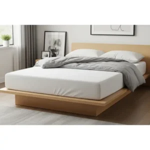 A 60 x 74 mattress placed on a minimalist platform bed frame, demonstrating its fit on standard foundations.