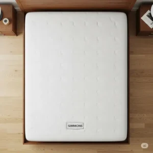 A clear image showing a Simmons king mattress perfectly fitted onto a standard frame, confirming its standard simmons king mattress dimensions.