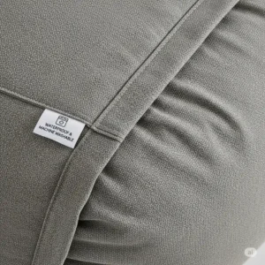 A detailed shot of the removable, machine-washable, and waterproof cover of the bean bag mattress, showing the durable fabric.