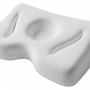  A detailed view of a cervical pillow's design, highlighting the specific indentations and neck support that align the spine.