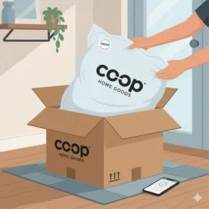 Unboxing the Coop Home Goods pillow, showing the branded packaging and vacuum-sealed pillow arriving in the mail for this Coop Home Goods pillow review.