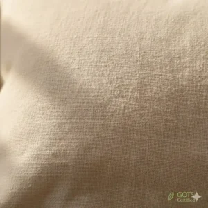 Close-up texture detail of the toddler pillow with organic cotton case fabric.
