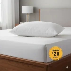 A hand pressing into a memory foam material, showing the quality of the best pillow under $20 on Amazon.