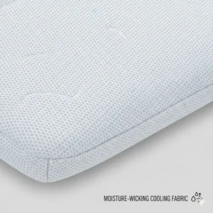 Macro view of the moisture-wicking fabric of a cooling pillow with removable cover.